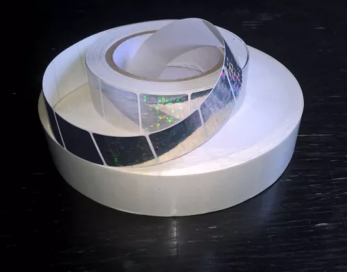 Hologram matrica Original-Genuine 30x30 mm 5 000 db / tekercs